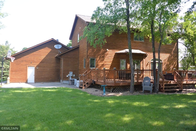 1706 Fairway Dr, Glencoe, MN 55336 - rear view of property featuring a wooden deck, a yard, a patio, and central AC unit