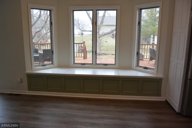 1706 Fairway Dr, Glencoe, MN 55336 - unfurnished dining area featuring dark wood-style floors and baseboards