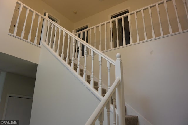 1706 Fairway Dr, Glencoe, MN 55336 - stairway with a towering ceiling