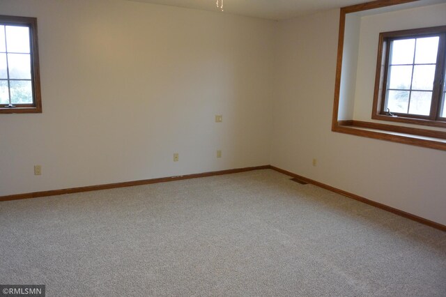 1706 Fairway Dr, Glencoe, MN 55336 - empty room featuring carpet and baseboards