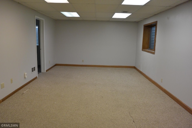 1706 Fairway Dr, Glencoe, MN 55336 - unfurnished room with light carpet, a paneled ceiling, and baseboards