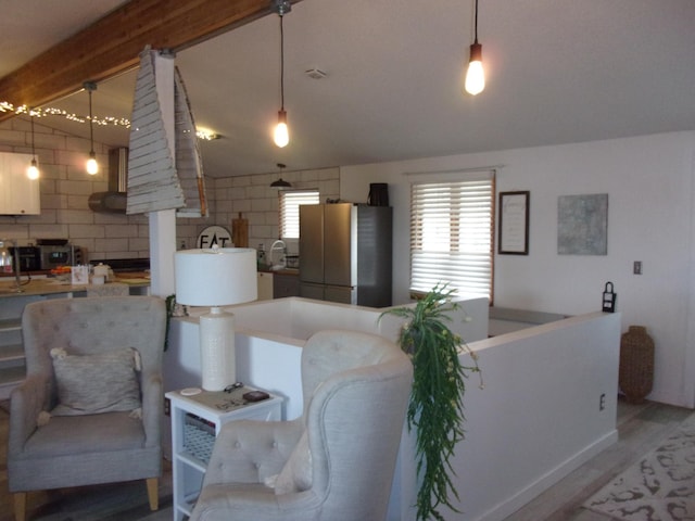 living area featuring light wood-style floors