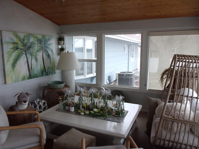 sunroom with lofted ceiling
