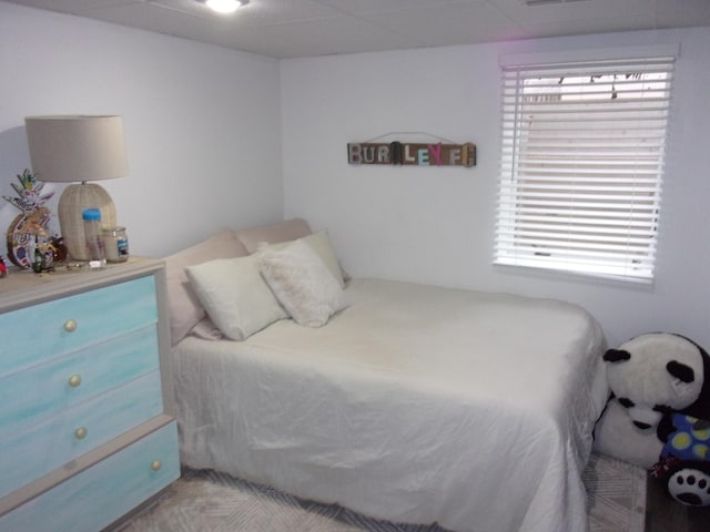 bedroom with multiple windows