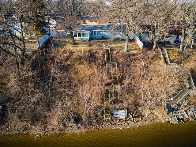 view of subject property with a nearby body of water