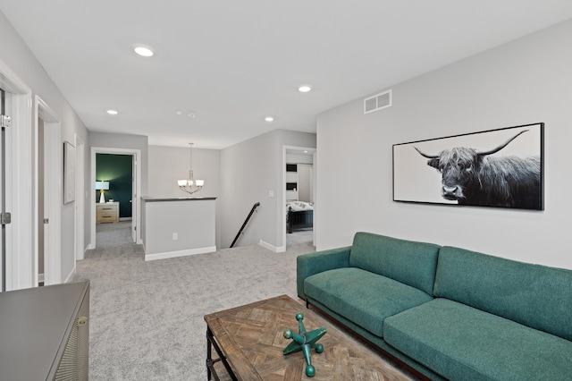 living room featuring recessed lighting, visible vents, carpet floors, baseboards, and a notable chandelier