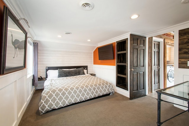 carpeted bedroom with washer / dryer, ornamental molding, visible vents, and recessed lighting