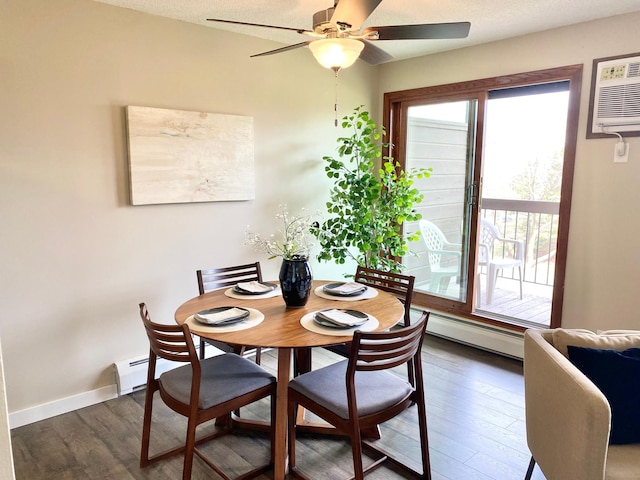 dining space featuring baseboards, ceiling fan, wood finished floors, and a wealth of natural light