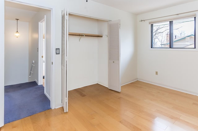 2749 Terraceview Ln N, Plymouth, MN 55447 - unfurnished bedroom with light wood-style flooring and a closet