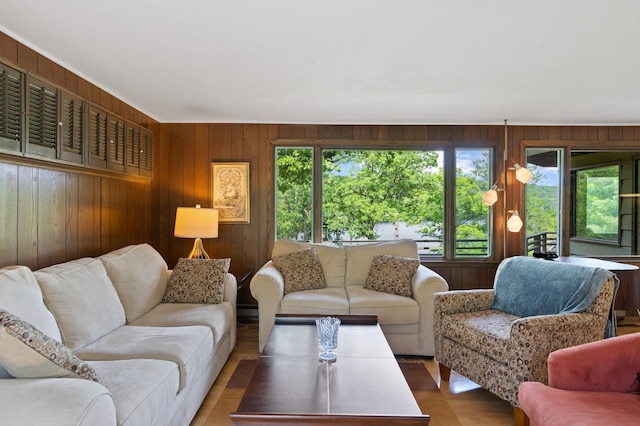 1109 Hamilton St, Saint Croix Falls, WI 54024 - living area featuring wood walls and wood finished floors