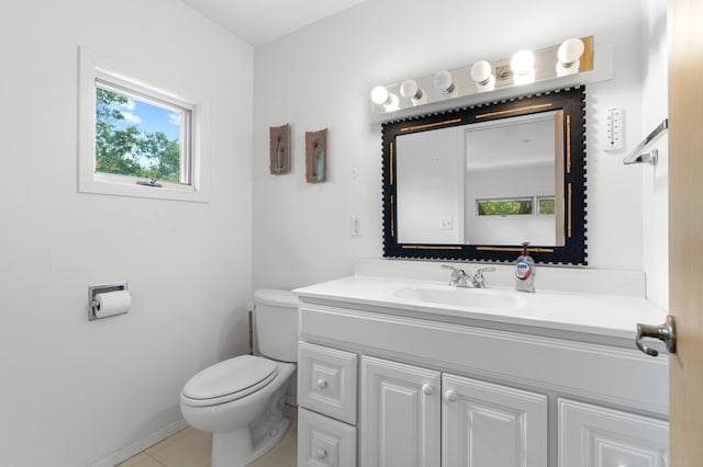 1109 Hamilton St, Saint Croix Falls, WI 54024 - bathroom with toilet, plenty of natural light, vanity, and tile patterned flooring