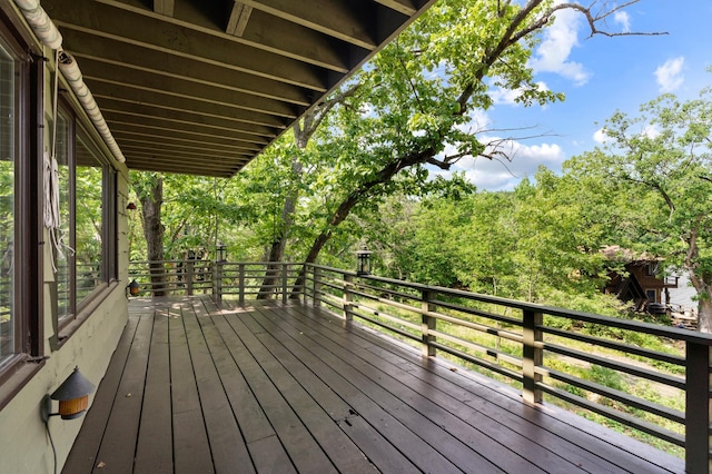 1109 Hamilton St, Saint Croix Falls, WI 54024 - wooden deck with view of scattered trees