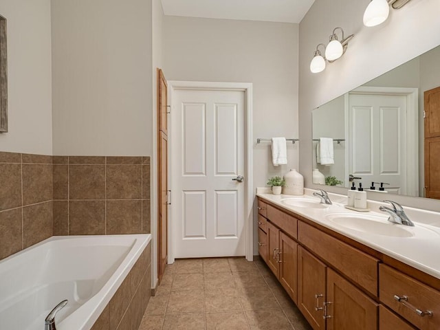 4730 Park Commons Dr Unit 215, Saint Louis Park, MN 55416 - bathroom with a garden tub, double vanity, and tile patterned flooring