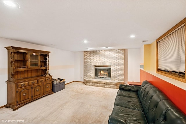 living area with visible vents, a brick fireplace, baseboards, light carpet, and recessed lighting