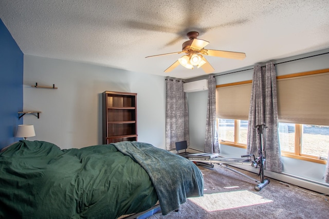 17367 Gull Lake Loop Rd NE, Bemidji, MN 56601 - bedroom featuring a wall unit AC, a textured ceiling, and a ceiling fan