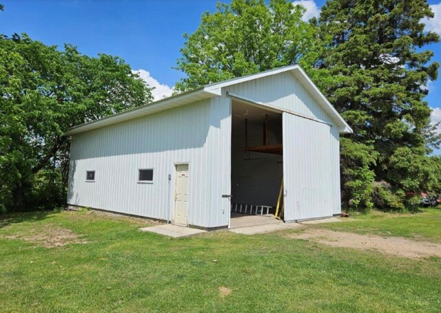 17367 Gull Lake Loop Rd NE, Bemidji, MN 56601 - view of pole building with a yard
