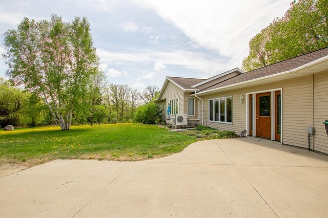 17367 Gull Lake Loop Rd NE, Bemidji, MN 56601 - view of grassy yard featuring a patio area and ac unit