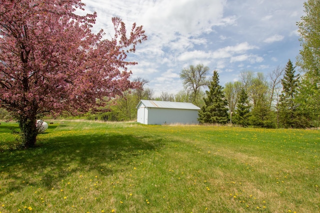 17367 Gull Lake Loop Rd NE, Bemidji, MN 56601 - view of grassy yard featuring an outbuilding and an outdoor structure