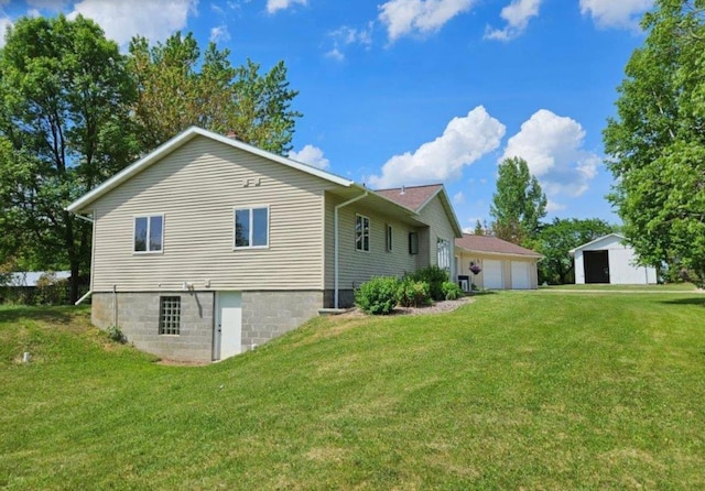 17367 Gull Lake Loop Rd NE, Bemidji, MN 56601 - view of side of home featuring a yard and a detached garage