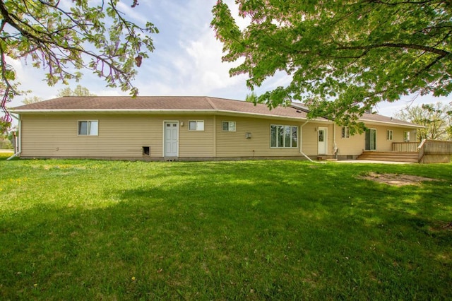 17367 Gull Lake Loop Rd NE, Bemidji, MN 56601 - back of house with a yard and a deck