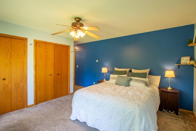 17367 Gull Lake Loop Rd NE, Bemidji, MN 56601 - bedroom featuring carpet floors, two closets, and ceiling fan
