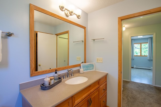 17367 Gull Lake Loop Rd NE, Bemidji, MN 56601 - bathroom featuring a baseboard heating unit and vanity