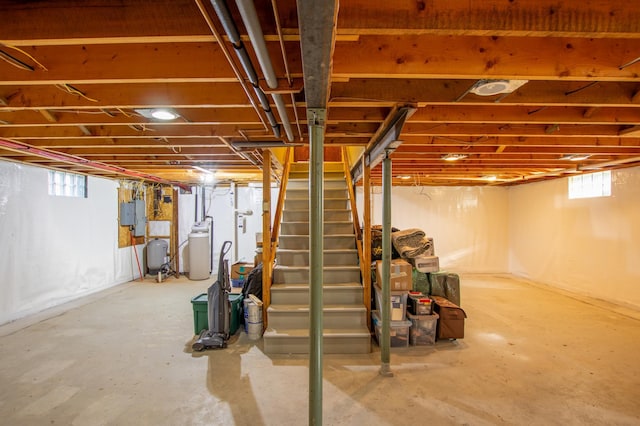 17367 Gull Lake Loop Rd NE, Bemidji, MN 56601 - basement with stairs, a water pressure tank, and a water softener