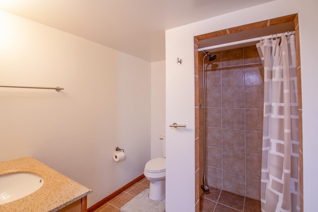 17367 Gull Lake Loop Rd NE, Bemidji, MN 56601 - bathroom featuring toilet, vanity, tiled shower, and tile patterned flooring