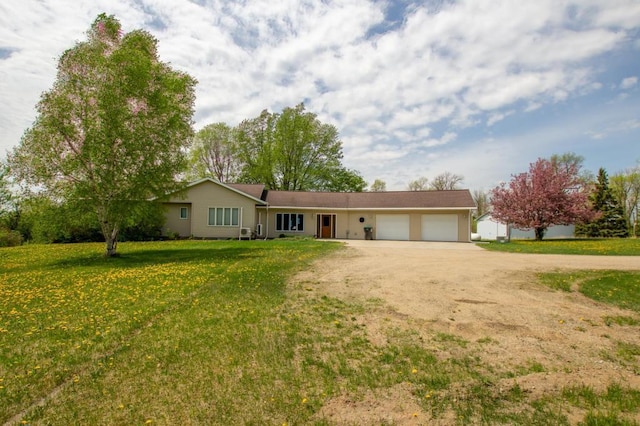 17367 Gull Lake Loop Rd NE, Bemidji, MN 56601 - single story home with dirt driveway, a garage, and a front yard