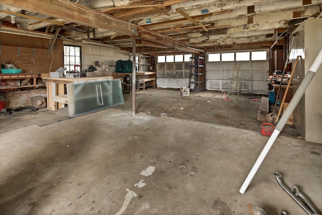 garage with a workshop area