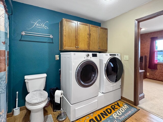 1126 US Highway 59, Garvin, MN 56132 - washroom with washer and dryer and light wood finished floors
