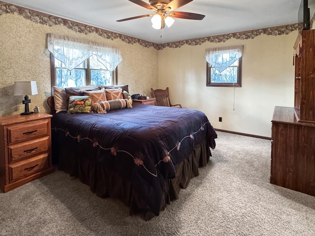 1126 US Highway 59, Garvin, MN 56132 - carpeted bedroom featuring multiple windows and ceiling fan