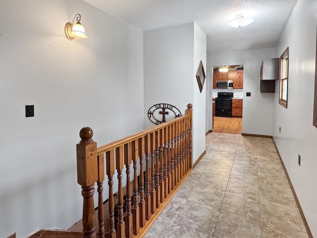 1126 US Highway 59, Garvin, MN 56132 - hall with an upstairs landing and a textured ceiling