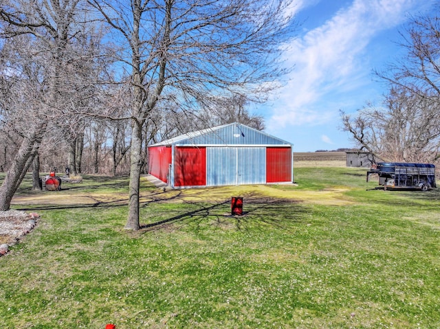 1126 US Highway 59, Garvin, MN 56132 - view of grassy yard featuring an outbuilding, an outdoor structure, and a detached garage