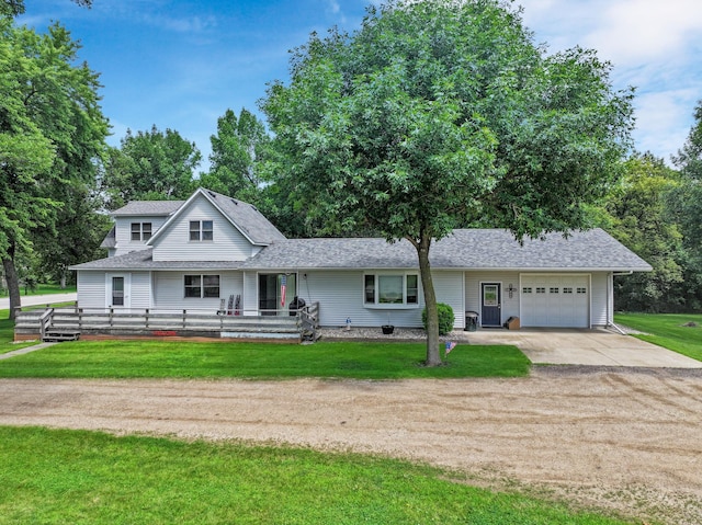 1126 US Highway 59, Garvin, MN 56132 - view of front of house with an attached garage, concrete driveway, a front lawn, and roof with shingles