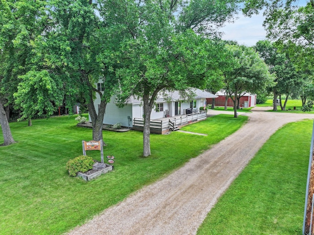 1126 US Highway 59, Garvin, MN 56132 - view of front of house featuring driveway, a front yard, and covered porch