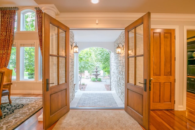 13980 Emerald Rdg, Minnetonka, MN 55305 - foyer featuring wood finished floors and crown molding