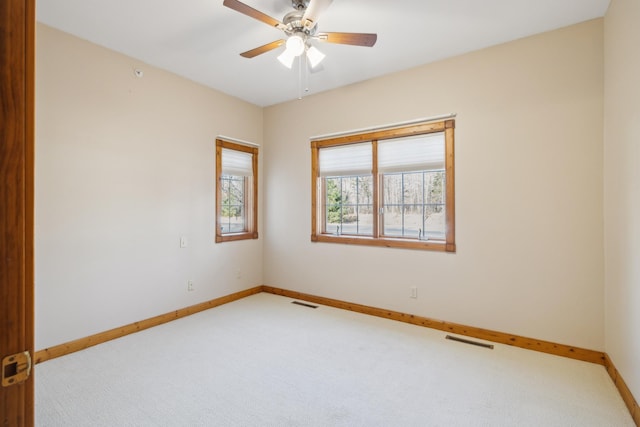 36306 Pine Bay Cir Unit 104, Crosslake, MN 56442 - carpeted spare room with baseboards and a ceiling fan