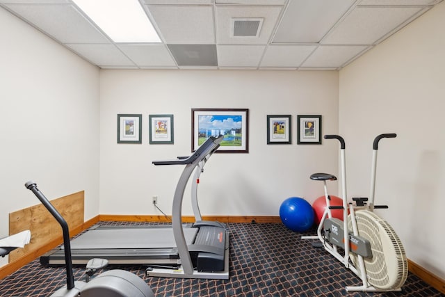 36306 Pine Bay Cir Unit 104, Crosslake, MN 56442 - workout area featuring baseboards, a drop ceiling, and carpet