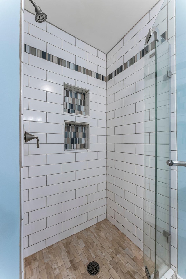 bathroom featuring a shower stall