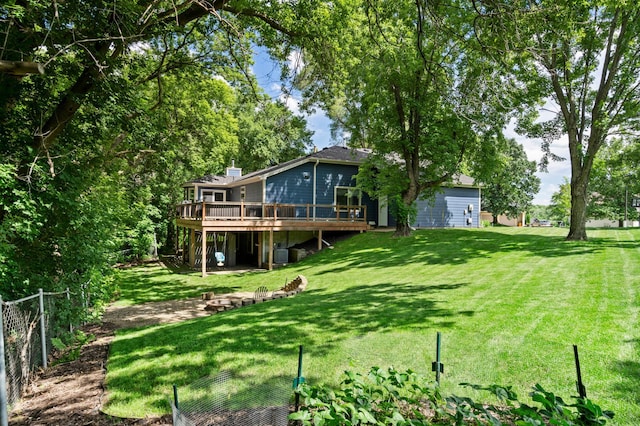 view of yard with a wooden deck