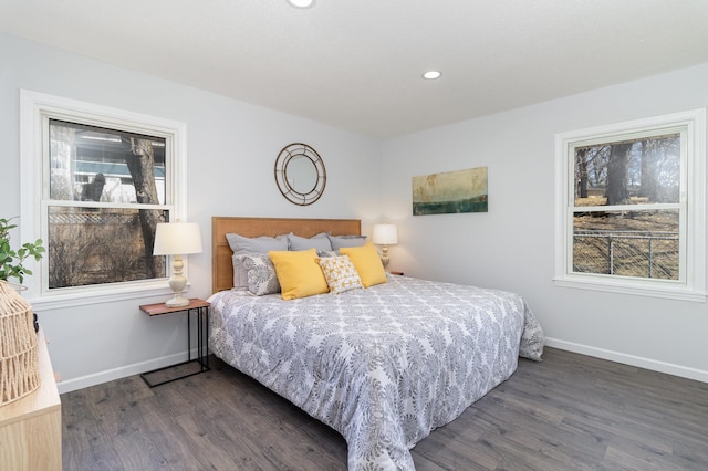 bedroom featuring baseboards, recessed lighting, and dark wood-style floors