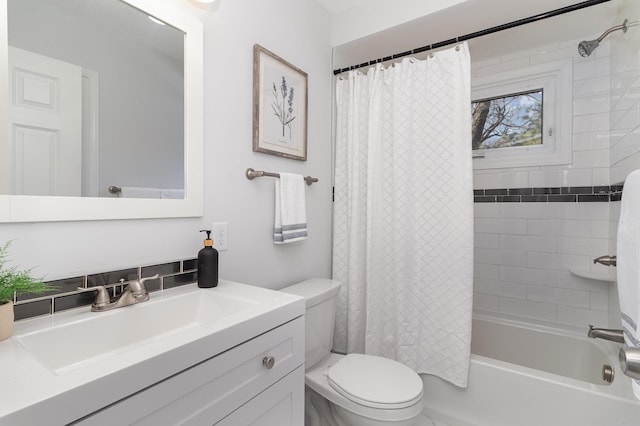 full bath featuring shower / tub combo, toilet, and vanity