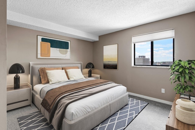 78 10th St E Unit 1410, Saint Paul, MN 55101 - carpeted bedroom featuring baseboards and a textured ceiling