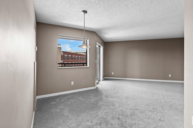 78 10th St E Unit 1410, Saint Paul, MN 55101 - carpeted spare room with baseboards and a textured ceiling