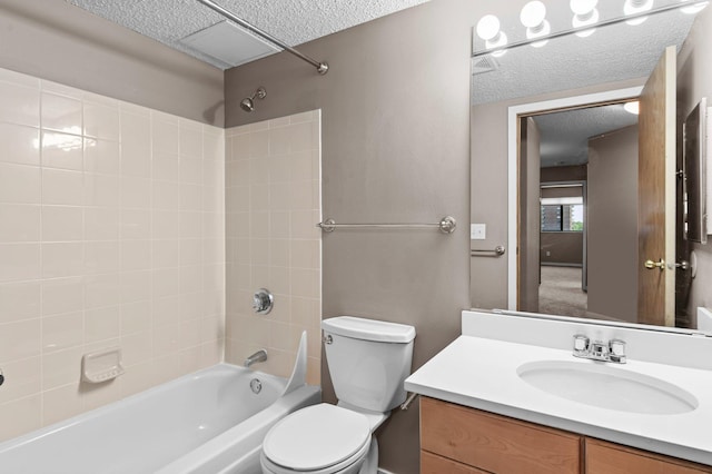78 10th St E Unit 1410, Saint Paul, MN 55101 - full bath with bathing tub / shower combination, toilet, vanity, and a textured ceiling