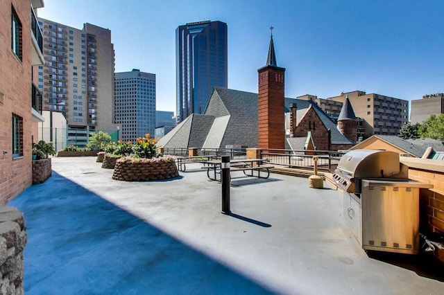 78 10th St E Unit 1410, Saint Paul, MN 55101 - view of patio with area for grilling and a city view