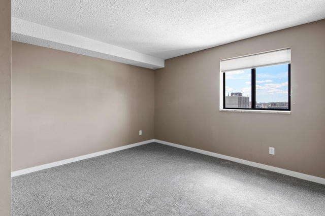 78 10th St E Unit 1410, Saint Paul, MN 55101 - empty room with carpet flooring, baseboards, and a textured ceiling
