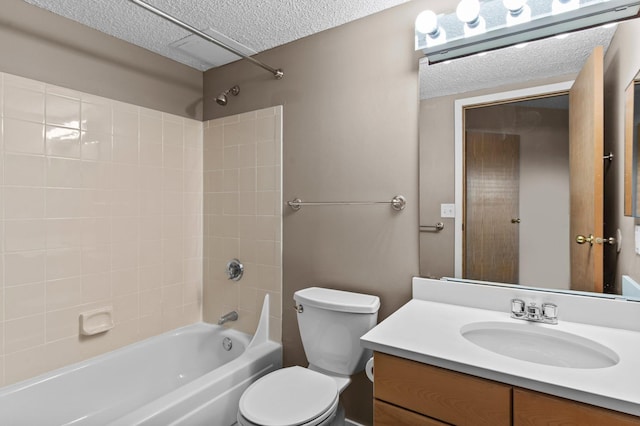 78 10th St E Unit 1410, Saint Paul, MN 55101 - bathroom featuring a textured ceiling, vanity,  shower combination, and toilet