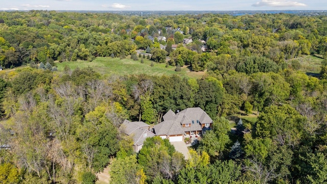 bird's eye view featuring a forest view